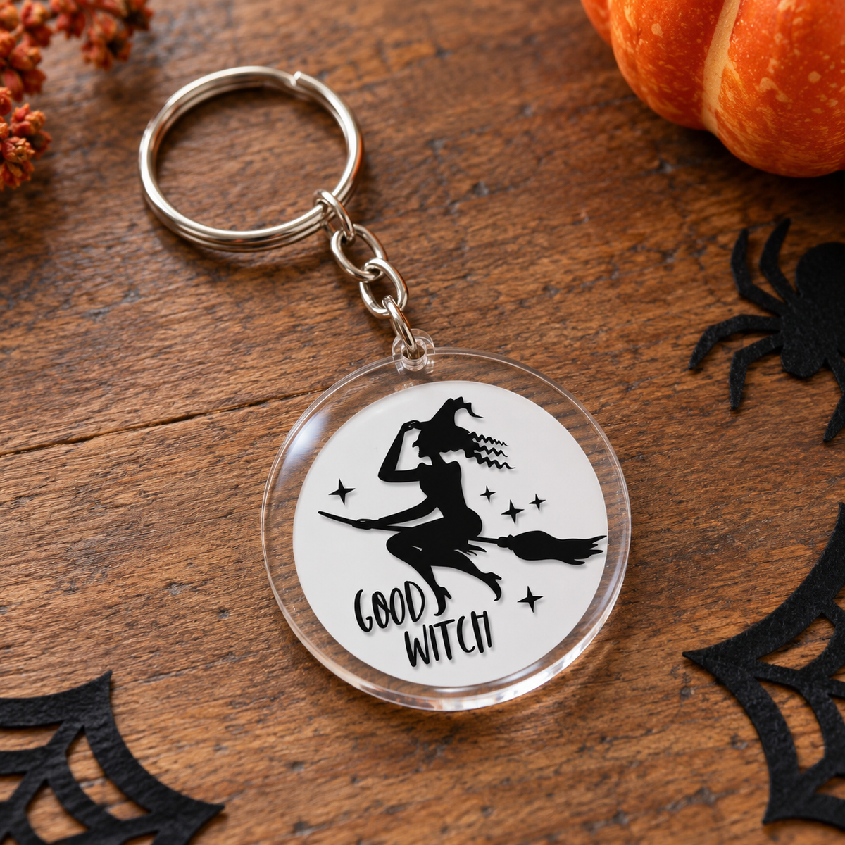 Porte-clés Halloween rond en acrylique Good Witch sorcière sur son balai
