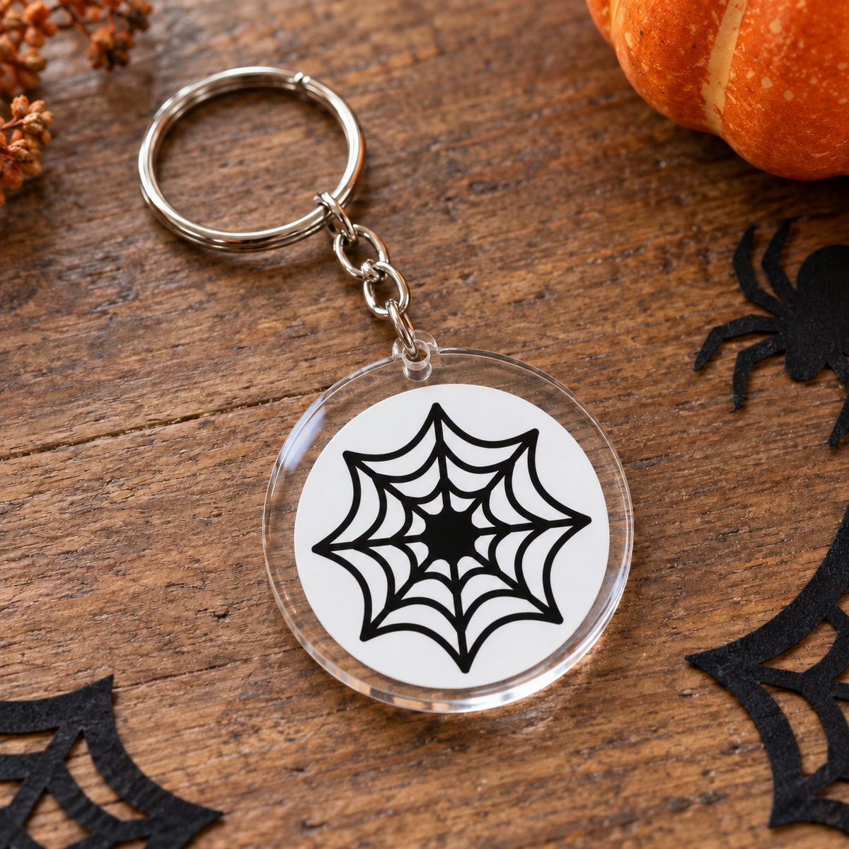 Porte-clés Halloween rond en acrylique grande toile d'araignée noire