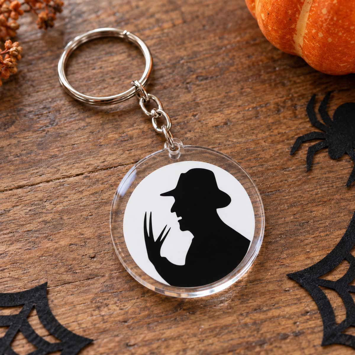Porte-clés Halloween rond en acrylique silhouette noire au chapeau